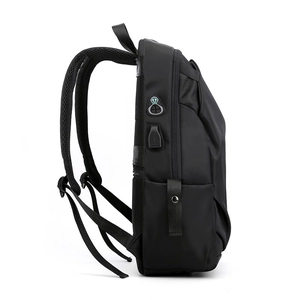 Black business backpack with USB charging port and breathable mesh straps shown in side view