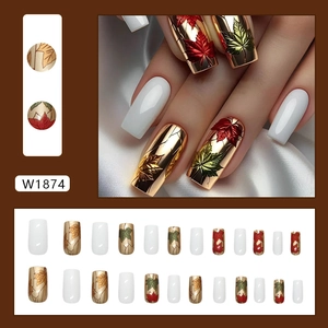 Retro red maple leaf press-on nails with 3D embossed gold accents, 24-piece coffin shape