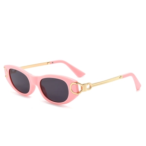 Lunettes de soleil œil-de-chat roses avec verres noirs et branches en métal doré