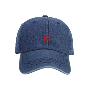 Vintage dark blue denim baseball cap with red embroidered R letter on a white background