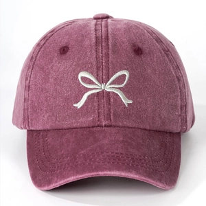 Washed red cotton baseball cap with white bow embroidery for outdoor sun protection