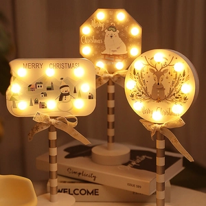 Christmas LED wooden street sign lamps featuring reindeer and snowman holiday decorations