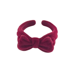 Elegant red flocked bow open ring with adjustable band for women in a vintage style