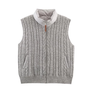 Detail of grey cable knit vest featuring a standing collar and leather zipper puller
