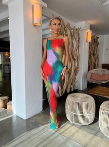 Detailed view of the colorful pleated maxi dress showing vibrant print and vertical textures