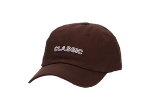 Close-up of classic embroidered white lettering on a dark brown cotton twill baseball cap