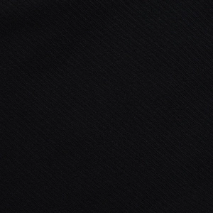 Κοντινό πλάνο μαύρου υφάσματος twill που δείχνει λεπτομερή υφή και πλεκτή δομή