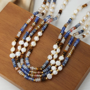 Bohemian multilayer necklace with freshwater pearls, blue stones and tiger eye beads