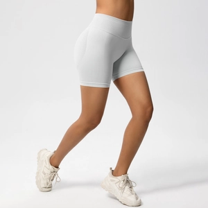 Detail of high waisted seamless gym shorts with ribbed texture and peach lift effect