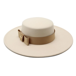 Elegant beige wool felt flat top hat with 10cm wide brim and golden bee ribbon bow