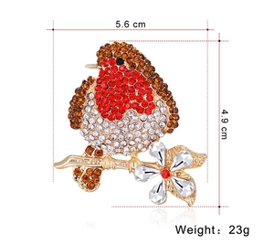 Detailed dimensions of the vintage bird brooch with red crystals, 5.6cm wide and 4.9cm high