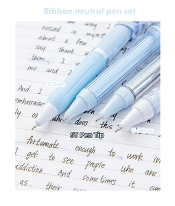 Detail of blue gel pen set with 0.5mm and 0.38mm ST tips on a handwritten notebook