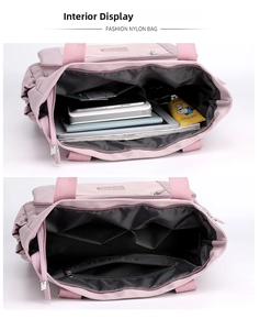 Vue intérieure du sac en nylon rose avec compartiments pour rangement organisé