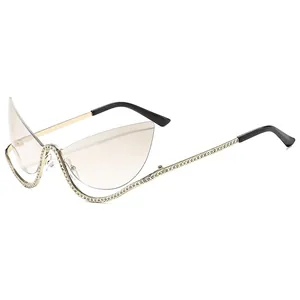 Fashion cat-eye semi-rimless sunglasses with gold metal frame and sparkling rhinestones