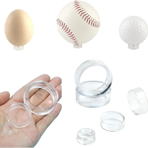Clear acrylic display rings for golf balls and baseballs on white background