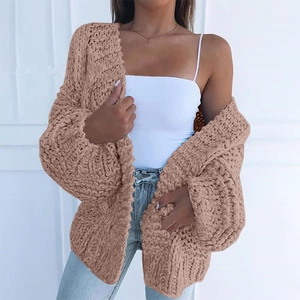 Close-up of thick mohair knit texture on long-sleeve oversized open front cardigan