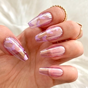 Close-up of long coffin press-on nails with pink purple chrome and butterfly design