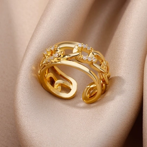 18K gold plated chain ring featuring sparkling cubic zirconia on a beige silk background