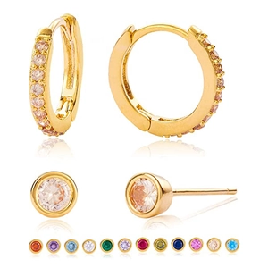 Detail view of gold hoop earrings and studs set featuring twelve colorful zircon stones