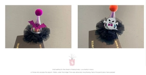 Detail of Halloween hair clips featuring laser purple bat and white ghost party hats