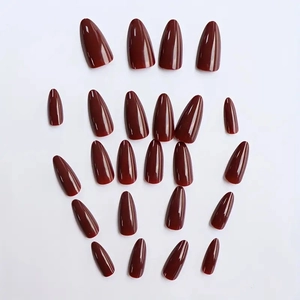 Glossy almond wine red pointed press-on nails set with 24 pieces on white background