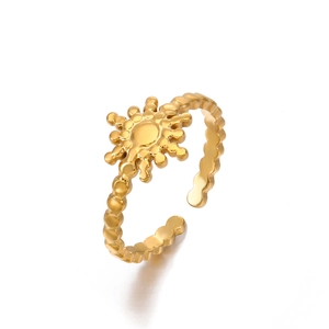 Adjustable gold plated stainless steel sunburst ring with wavy band on white background