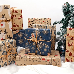 Christmas kraft wrapping paper rolls with festive deer and tree patterns for DIY gift packing