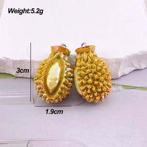 Detailed view of resin durian charms showing texture and size of 3cm height