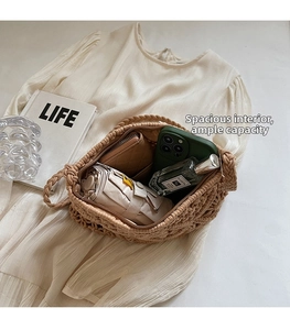 Internal view of a handwoven crossbody bag showing capacity for phone, umbrella, and wallet