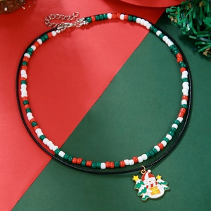 Close-up of a double-layer Christmas beaded necklace with a cute snowman pendant