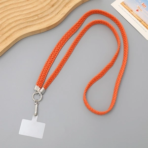 Close-up of orange braided phone lanyard with silver metal ring and clear gasket