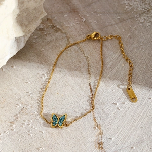 Chic gold-plated stainless steel bracelet featuring a blue zircon butterfly pendant