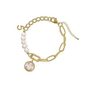 Golden pearl bracelet with a number 5 charm and sparkling smiley face pendant