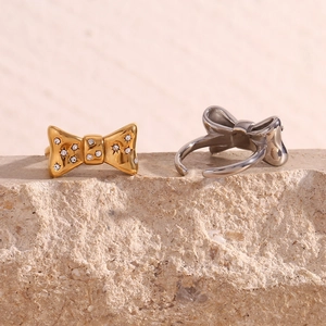 18K gold plated and silver bow knot open rings with micro-set diamonds on stone