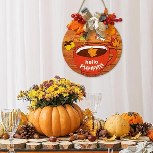 Fall wooden hello pumpkin door sign with check bow, red coffee cup and maple leaf decor
