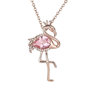 Rose gold flamingo necklace with pear-cut pink gem and zircon-studded wings on white background