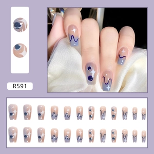 Macro detail of purple gradient press-on nails with star patterns and 24 pieces set