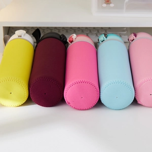 Bottom view of colorful neoprene insulated cup sleeves with carrying straps and buckles