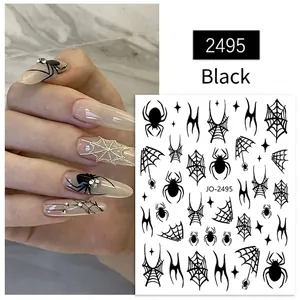 3D Halloween nail stickers with black spiders, webs and stars on marble background