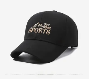 Close-up of Outdoor Sports embroidery and mountain motif on a black baseball cap