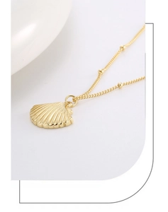 Detailed view of S925 silver shell pendant necklace with gold plating and beaded chain