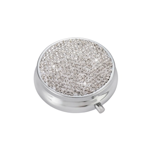 Sparkling diamond-encrusted silver metal pill box with round portable waterproof design