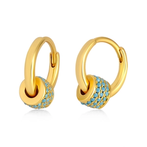 Detail of gold hoops with rotating turquoise pavé cylinders on white background
