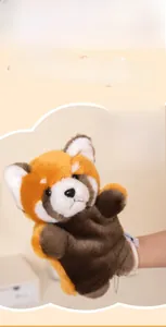 Detailed view of soft red panda hand puppet with realistic plush texture and white markings