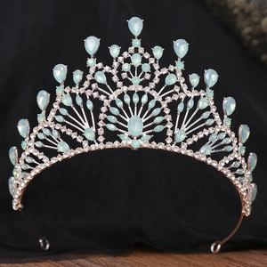 Elegant vintage bridal crown with silver alloy, white rhinestones and blue waterdrop gems