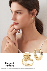 Detailed view of S925 sterling silver gold teardrop earrings with Moissanite stone