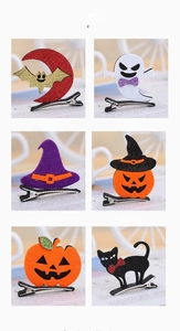 Detail set of six Halloween clips including pumpkin, ghost, and bat with glitter accents