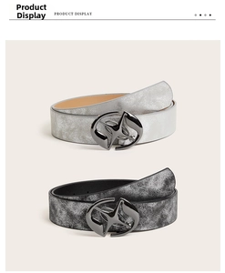 Detail of glitter textured belts with avant-garde gunmetal hollow buckles in silver and grey