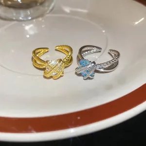 Elegant crossover zircon open ring with twisted band in gold and silver plating