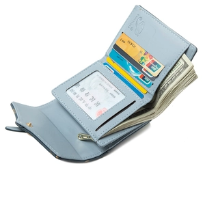 Light blue tri-fold wallet for women featuring multiple card slots and a zipper coin pocket